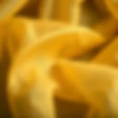 Close-up of the intricate weave of gold organza fabric