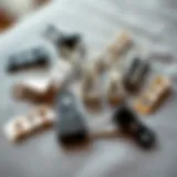 A close-up of various types of hemming clips arranged artistically on a fabric swatch