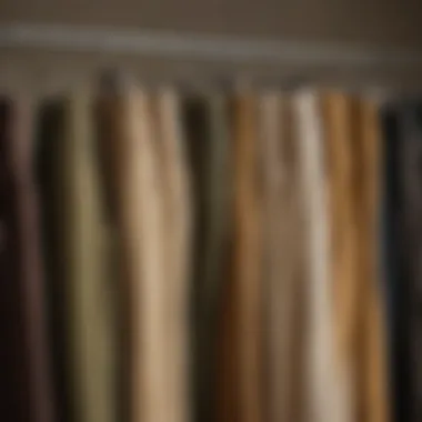 An array of different khaki corduroy pants styles displayed on hangers.