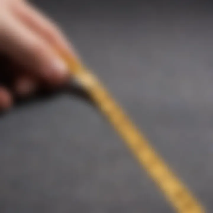 Close-up of a soft tape measure being used to take measurements on a fabric, showcasing its utility in garment construction.