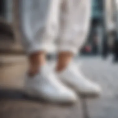 Urban street fashion featuring white tabi sneakers paired with contemporary outfits.