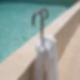 Stylish outdoor hook for hanging towels at a poolside