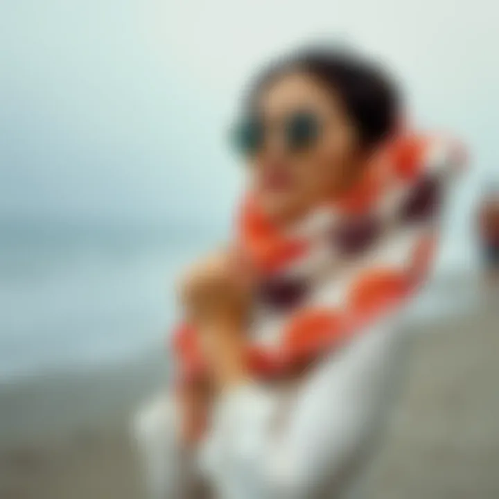 Fashionable individual wearing a UV protection shawl at a beach setting